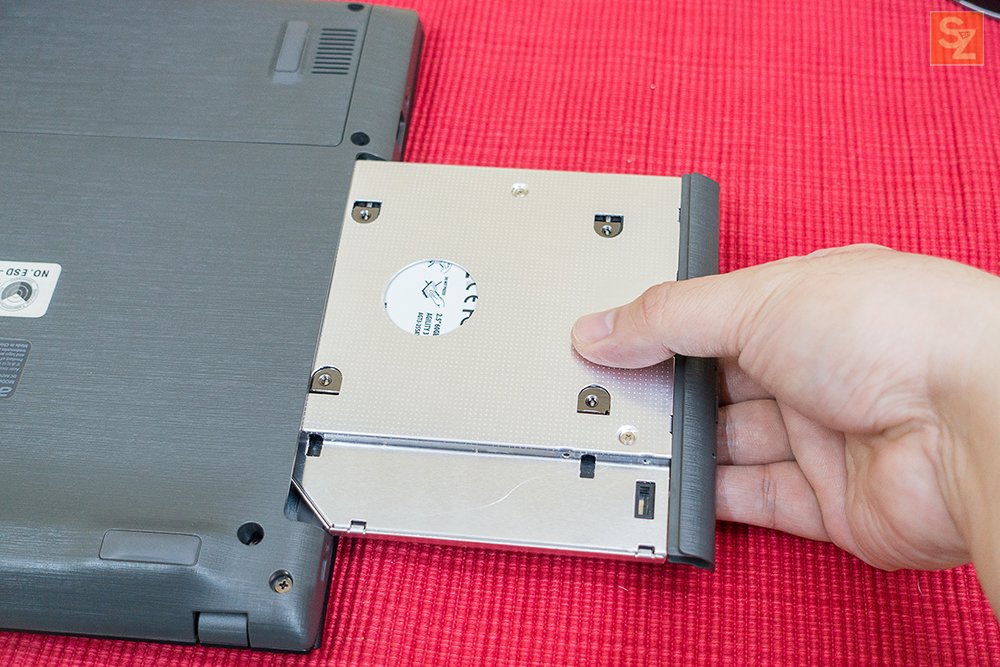 insert back hdd caddy into laptop